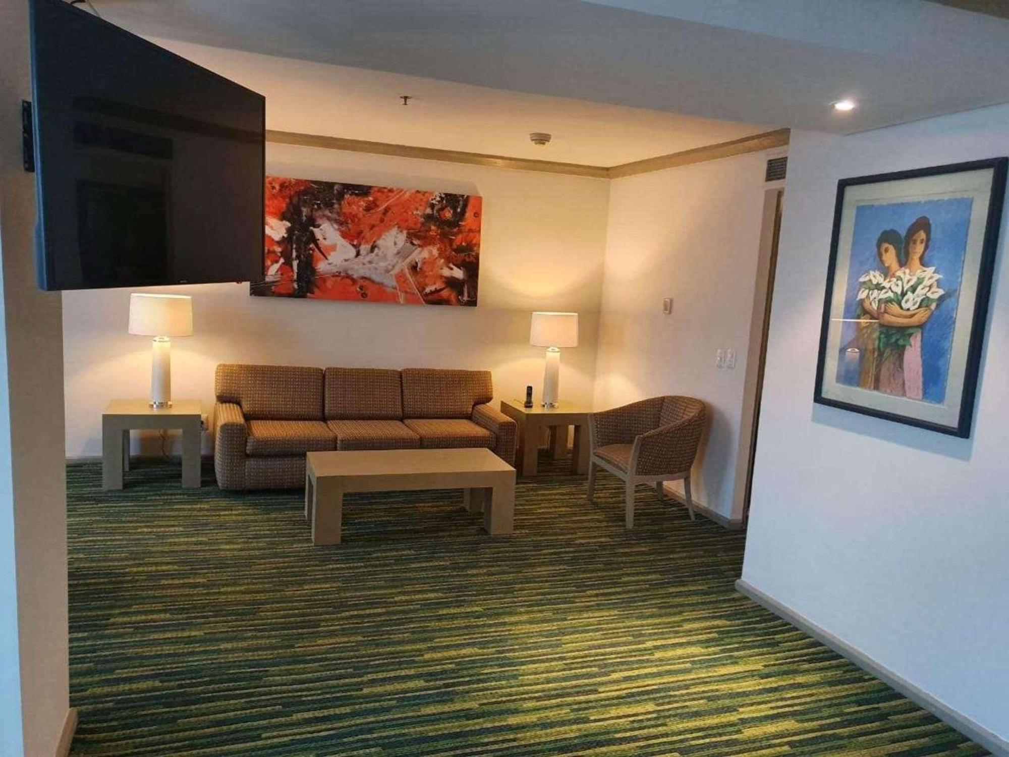 Radisson Paraiso Hotel Mexiko-Stadt Exterior foto A living room at the hotel